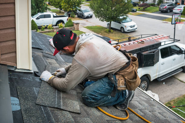 Professional Gutter Installation technician working in Pineville, KY
